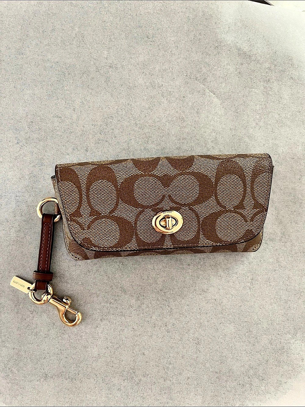 Coach Signature Canvas Turnlock Wristlet Brown